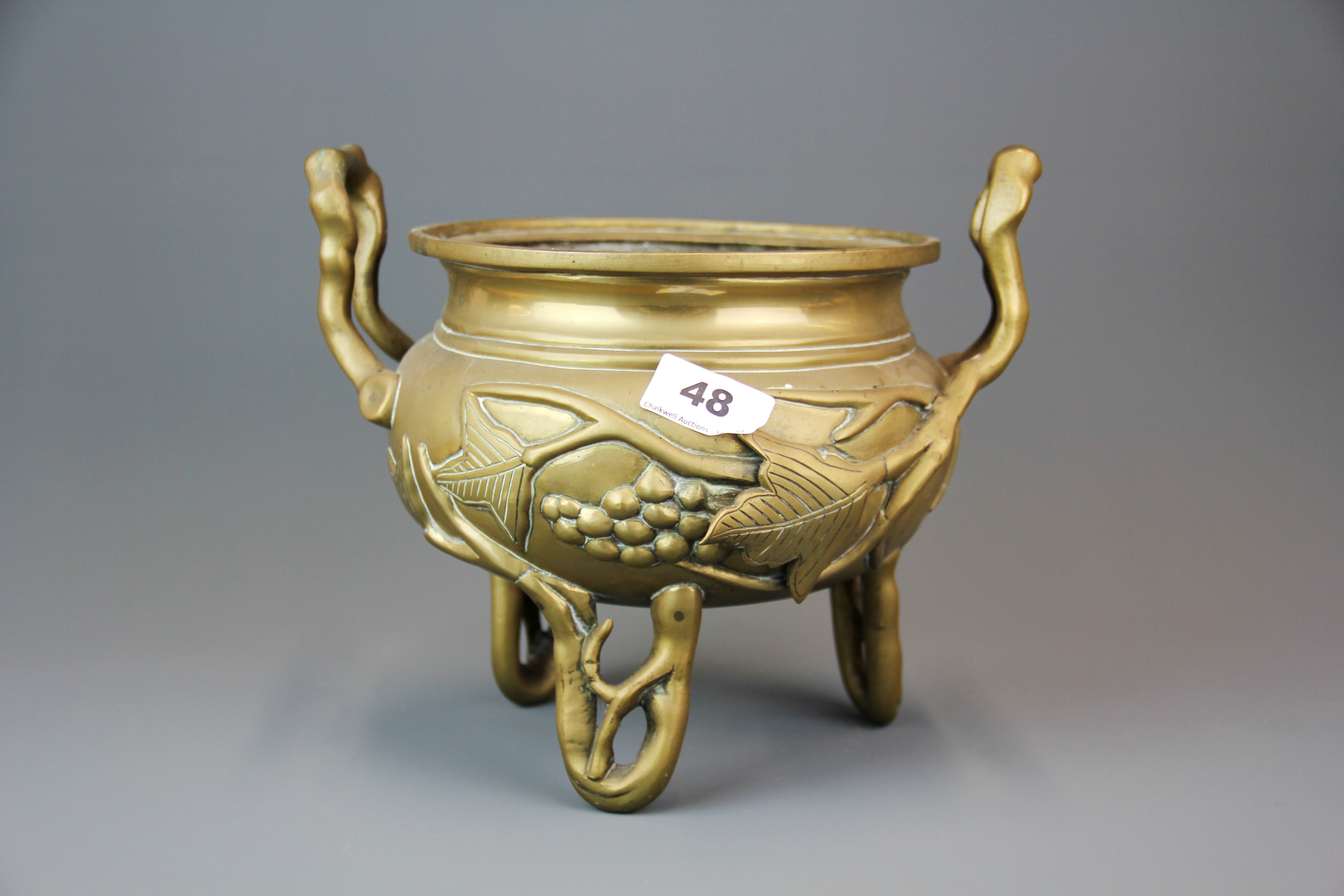 An early 20th century Chinese bronze censer, H. 21cm.