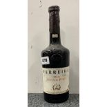 A bottle of 1963 Ferreira vintage port.