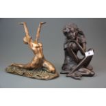 An Art Deco style cold cast copper finished figure, together with a further cold cast figure, H.