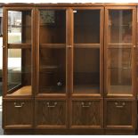 A useful three section oak veneered display cabinet, W. 179cm. H. 178cm.