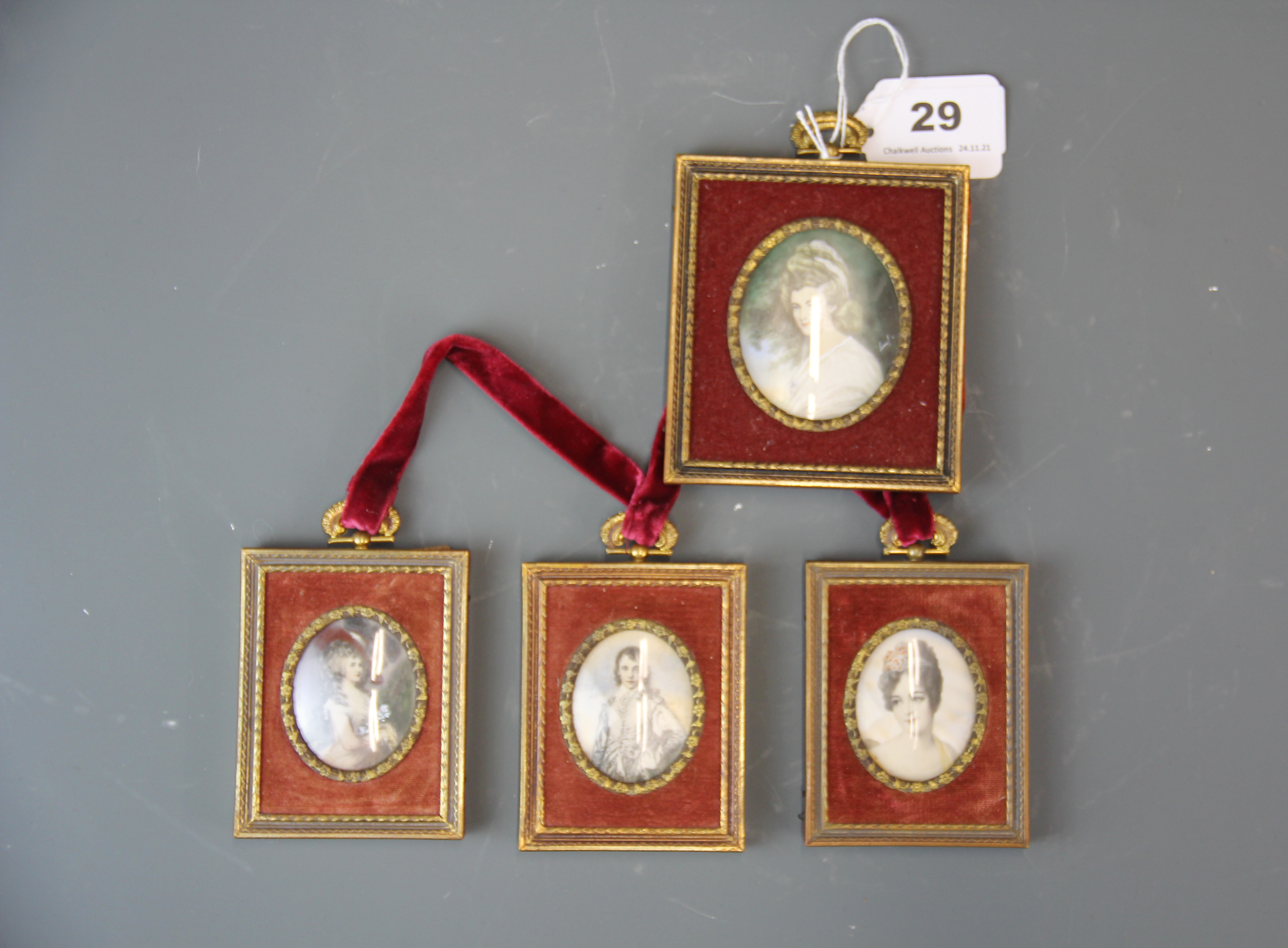 A group of four hand painted reproduction miniatures, largest 9.5 x 11cm.