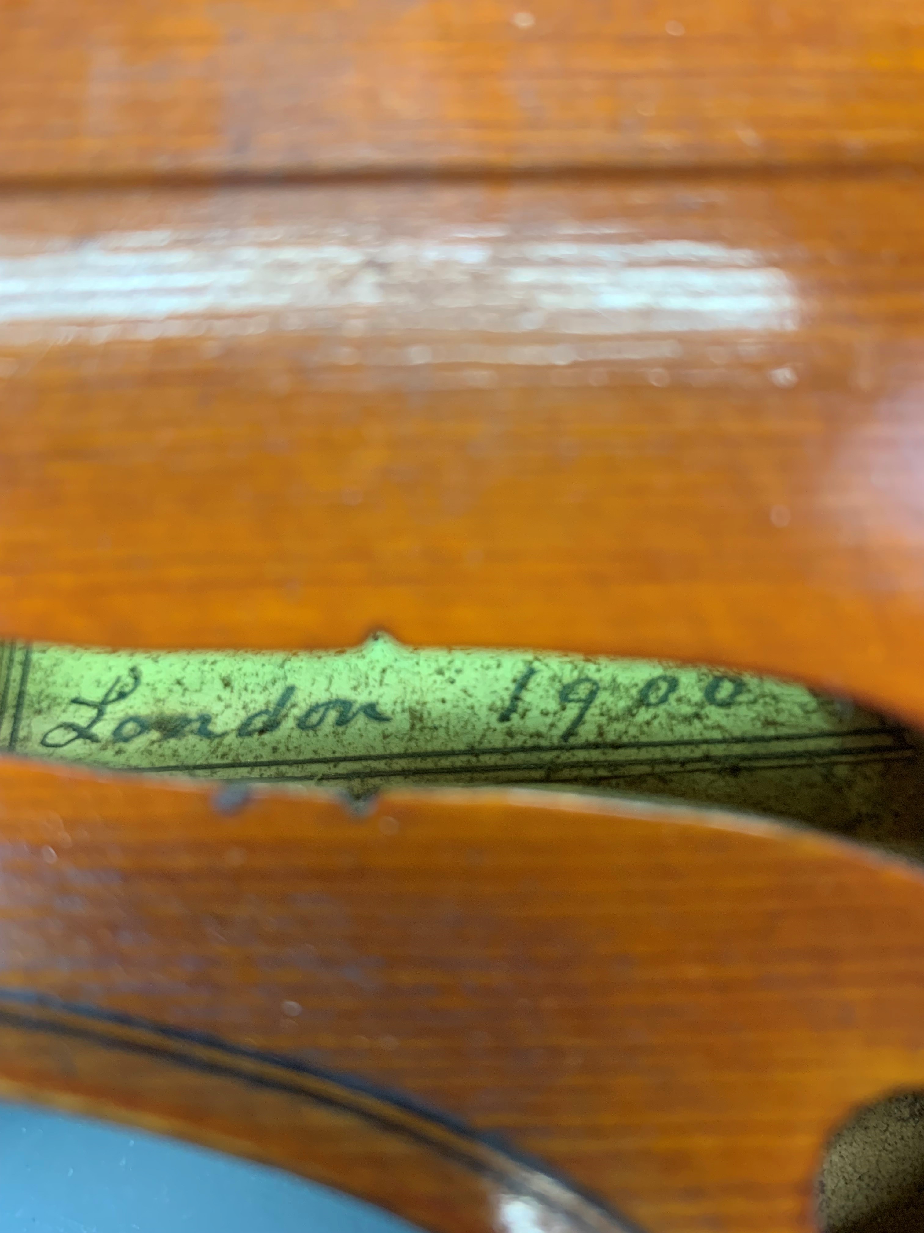 An antique cased violin with three bows, with a hand written label reading Emanuel Whitmarsh, London - Image 3 of 9