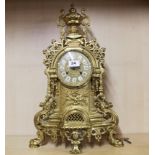 A large gilt brass mantle clock, H. 59cm.