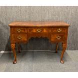 A lovely early 20th century Jacobean style walnut veneered desk, 106 x 54 x 77cm.