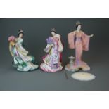 Two Danbury mint and one Franklin mint porcelain figures of oriental women, tallest H. 28cm.
