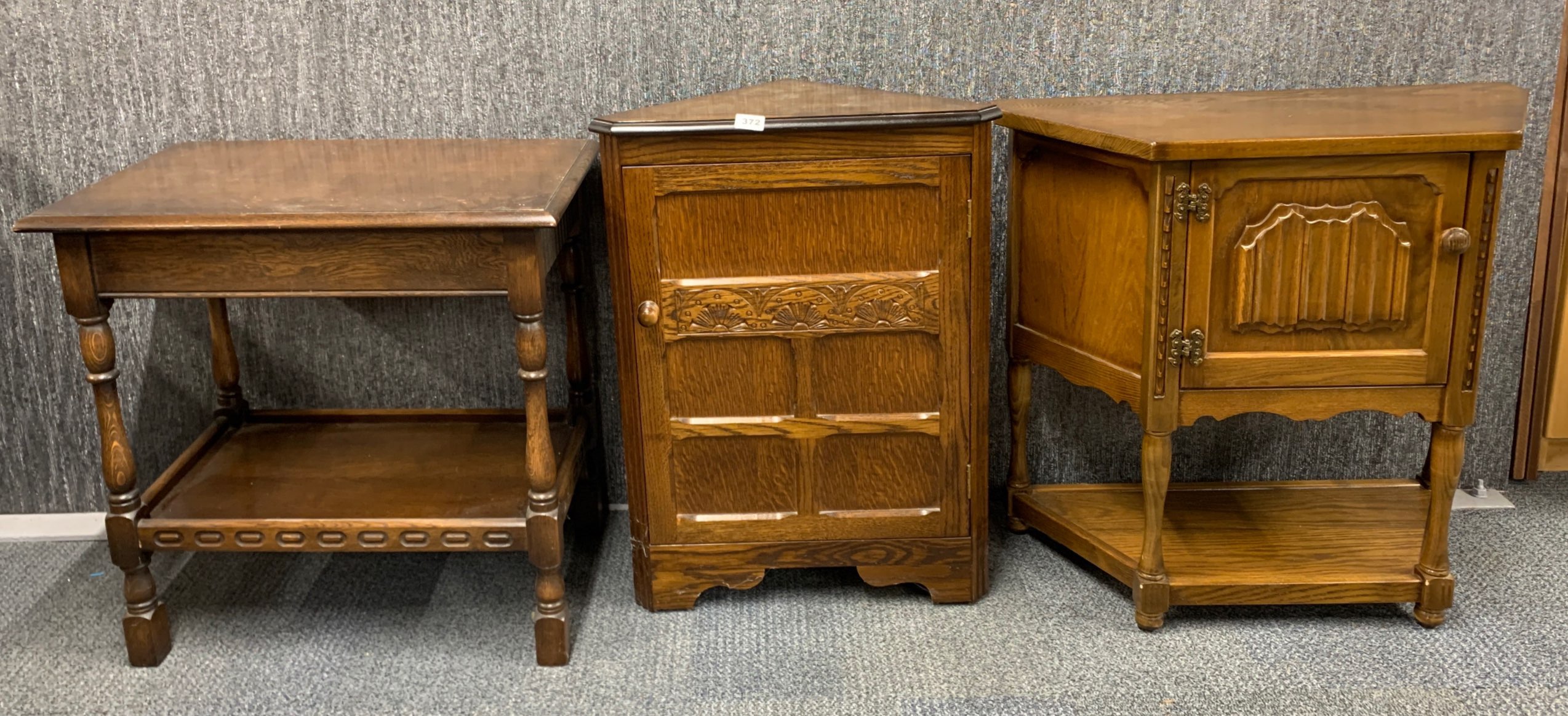 A carved oak hall cabinet, corner cabinet and trolley, hall cabinet size 75 x 33 x 72cm.