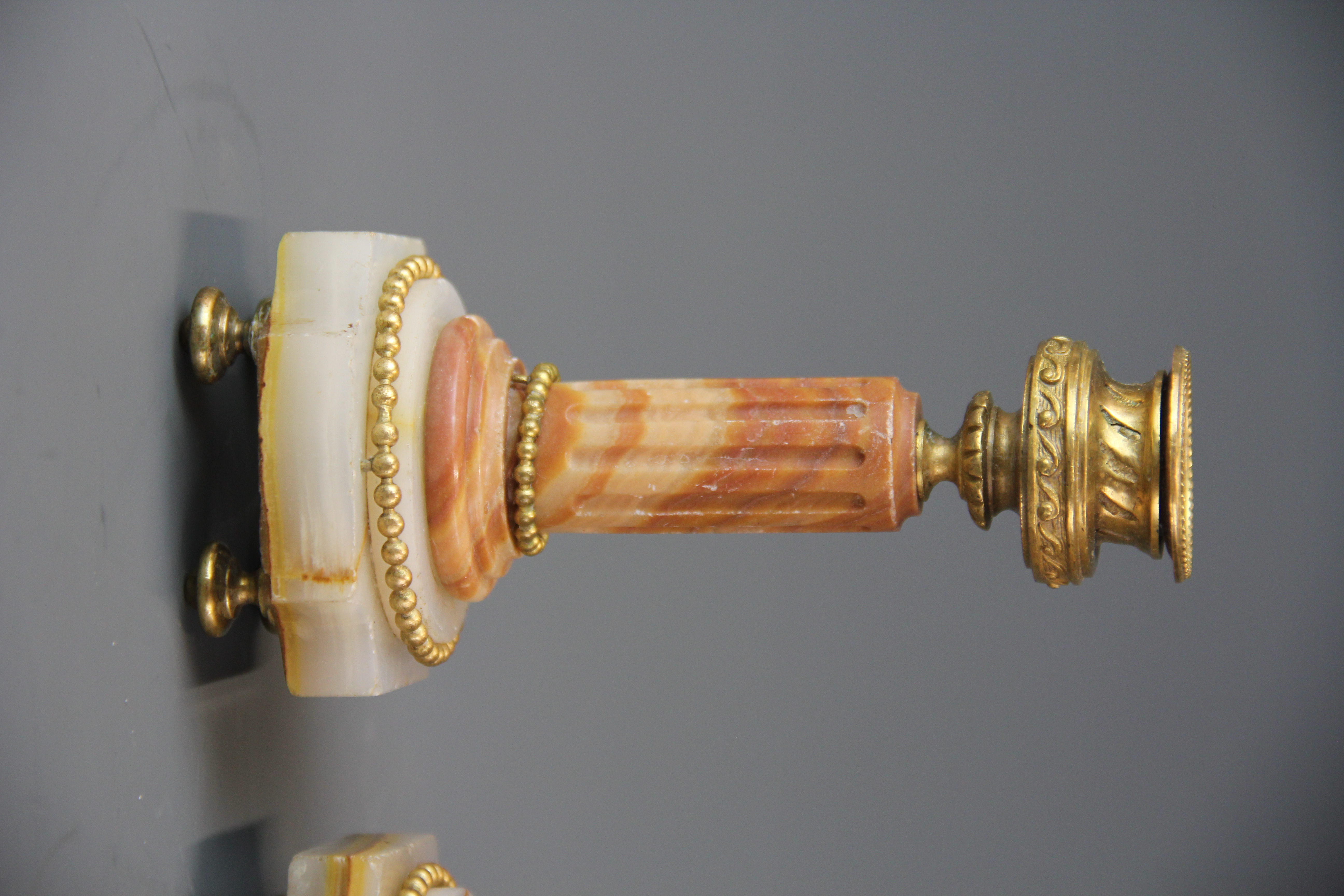 A pair of 19th century onyx and ormolu candlesticks, H. 16.5cm. - Image 2 of 2