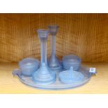 An Art Deco pale blue glass spiders web pattern dressing table set.