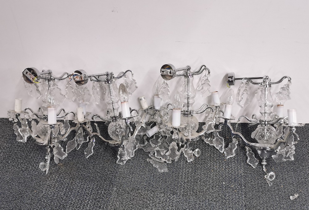 A set of four interesting chromium plated and crystal wall lights, H. 32cm.