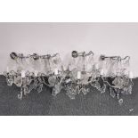 A set of four interesting chromium plated and crystal wall lights, H. 32cm.