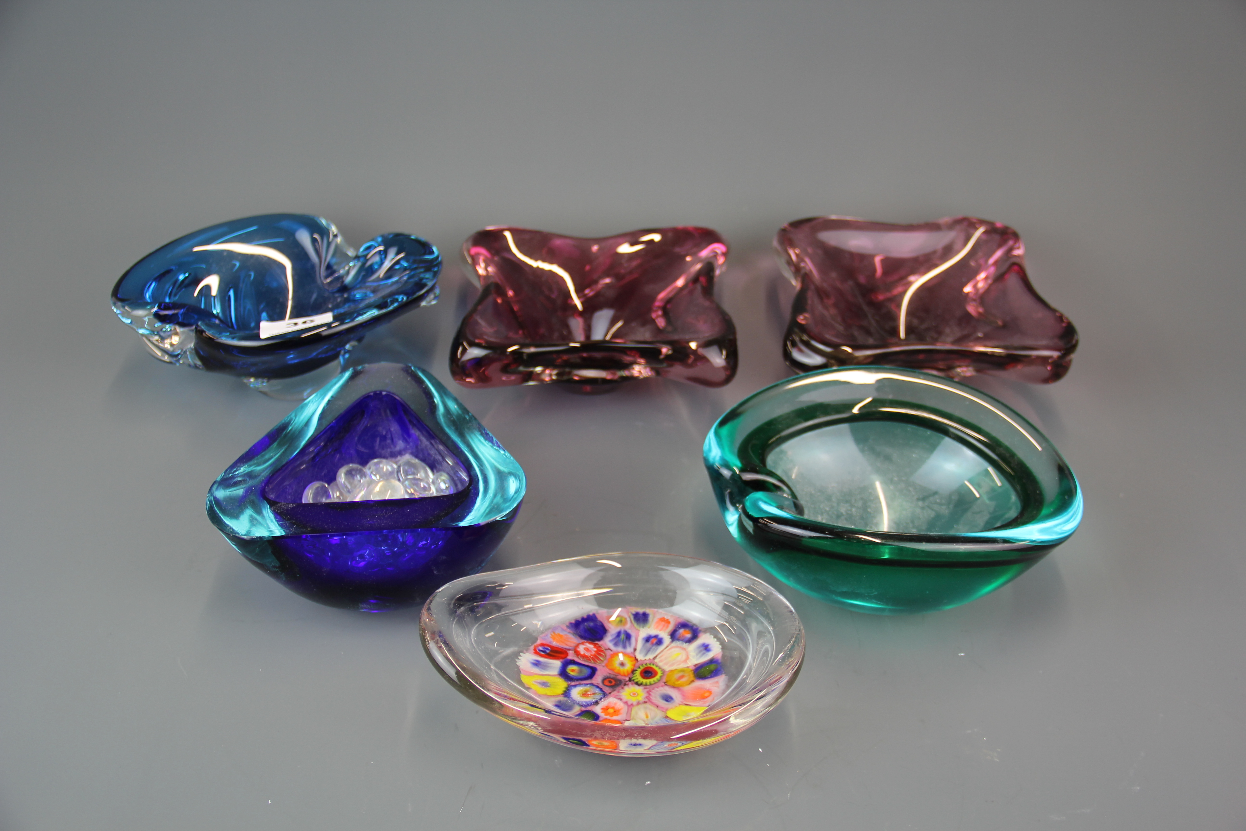 A group of six Murano glass bowls.