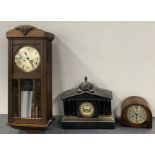 A Victorian slate mantle clock, an oak wall clock and an oak mantle clock.