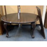 A 1920's ball and claw foot extending oval mahogany dining table, 106 x 132, Extending to 186cm.