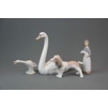 A Lladro figure of 'Graceful Swan' #5230 (with box) H. 21.5cm. together with three further Lladro