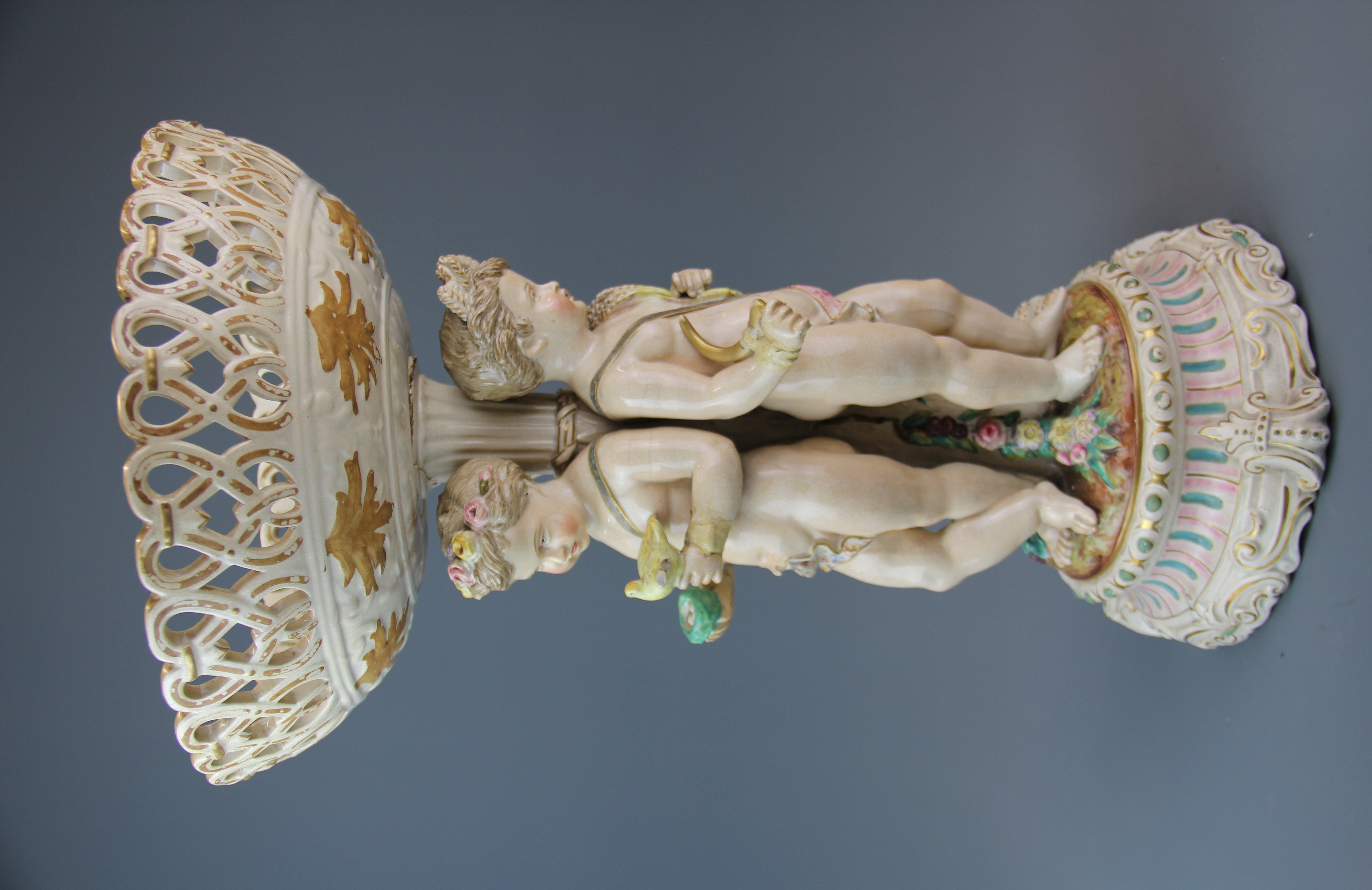 An 18th/early 19th century soft paste porcelain comport centre piece, H. 44cm. A/F