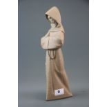 A Lladro figure of a monk #2060 withdrawn 1998, H. 34cm.