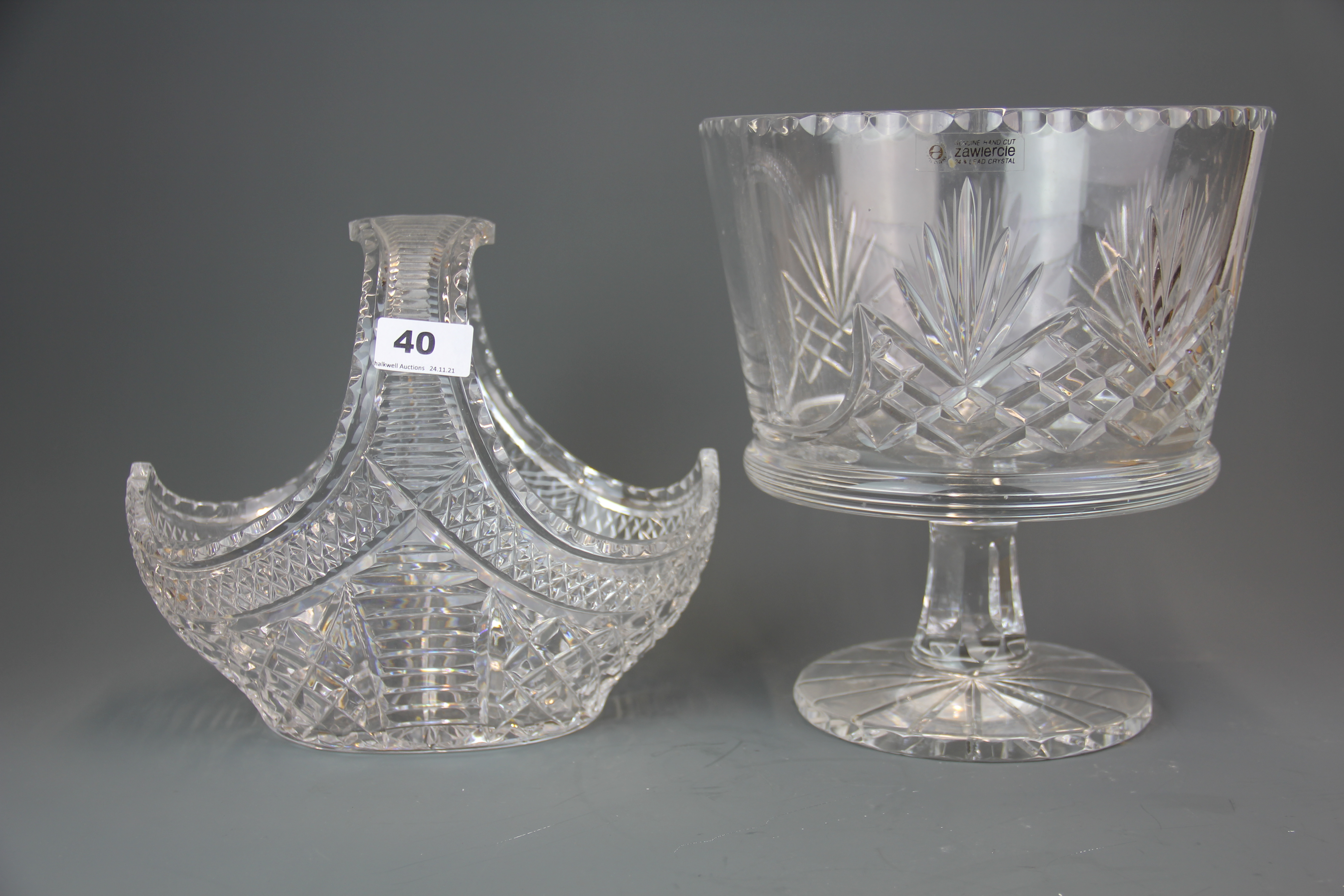 A large hand cut lead crystal centrepiece, H. 27cm. Together with a cut crystal basket.