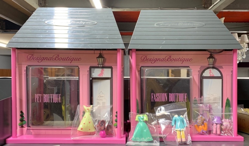 Two designer boutiques and a box of vintage Polly Pocket clothes, complements and others.