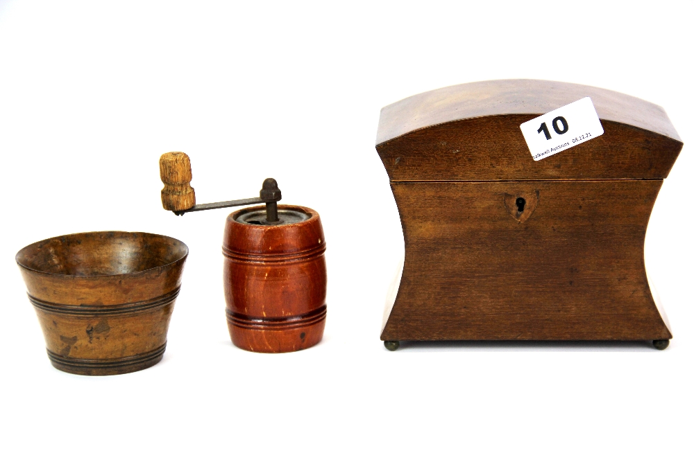 A small Regency mahogany tea caddy, H. 13cm together with a treen, salt bowl and pepper grinder.