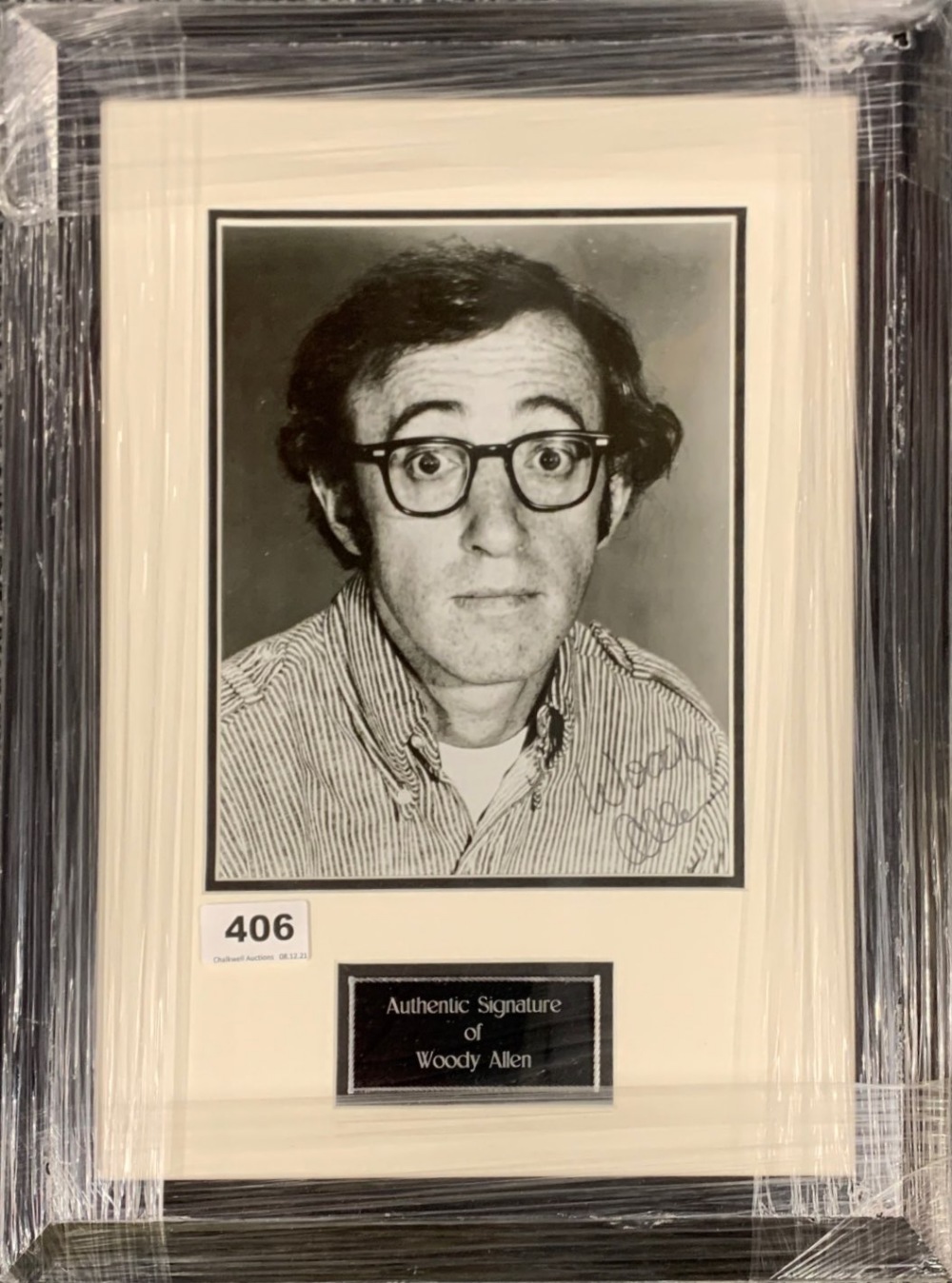 Autograph interest: Framed autograph of Woody Allen (American, November 1935- Present).