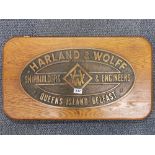 An oak mounted bronze Harland & Wolff shipyard plaque, 70 x 39cm.