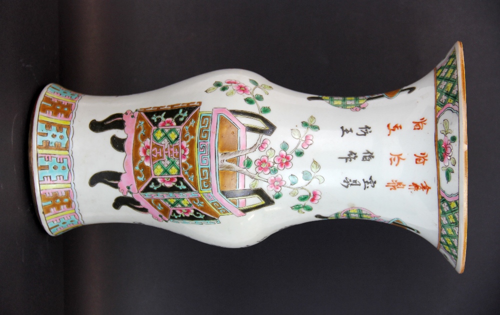 A 19th century Chinese hand enamelled porcelain vase, H. 34cm. (Very minor rim chip).