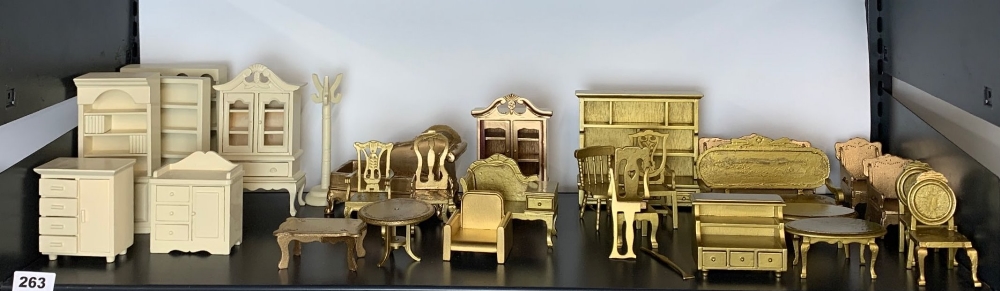 A large quantity of dolls house gilt and white painted wooden living room furniture.