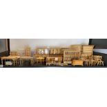 A large quantity of dolls house wooden furniture.