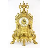 A large gilt brass mantle clock, H. 59cm.