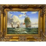 A gilt framed oil on board of sailing ships, frame size 56 x 46cm.