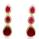 A pair of 925 silver gilt drop earrings set with pear cut rubies and white stones, L. 3.2cm.