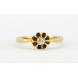 An 18ct yellow gold solitaire ring set with an old cut diamond, (M.5).