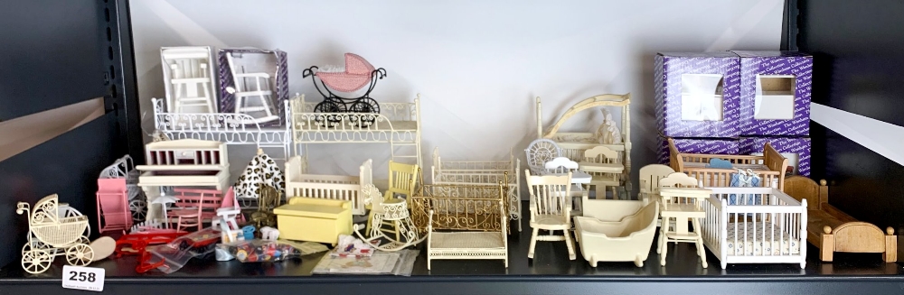 A large quantity of dolls house nursery and children items, including some painted metal and wood