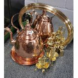 A pair of spiral brass candlesticks, a large copper kettle, a brass framed mirror and three