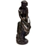 A superb signed bronze figure of a slave girl, c. 1900. Signed on reverse, H. 46cm.