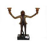 An interesting 'Bill Huebbe' style monkey composition candlestick, H. 36cm.