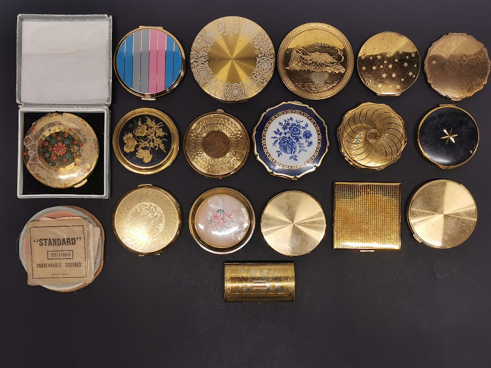 A collection of vintage compacts.