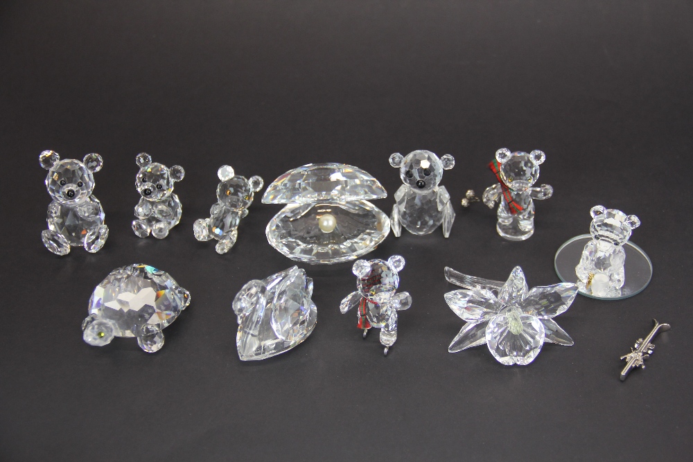 A quantity of Swarovski crystal items.