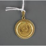 A Dutch five guilder gold coin, dated 1912, in a 14ct gold mount.