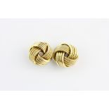 A large pair of 9ct yellow gold knot style stud earrings, L. 1.5cm. Approx. 3.4gr.