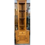 A lovely carved golden oak veneered cabinet, H. 208.5cm