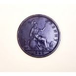 A United Kingdom Queen Victoria 1 penny coin, c. 1869.