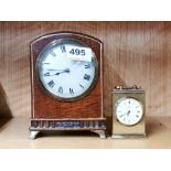 A 1920's brass mounted mahogany mantle clock, together with a small Astral carriage clock.