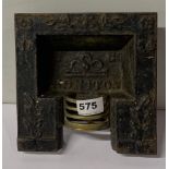 A Victorian cast iron and brass miniature sample fireplace for J.C Honiton, 19.5 x 19cm.