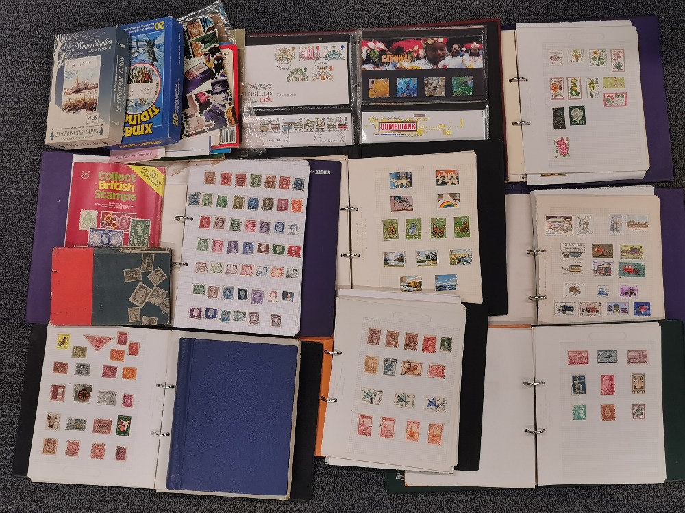 A quantity of stamp albums and loose stamps.