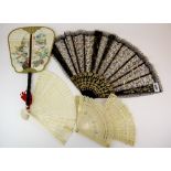 A group of mixed bone, celluloid and other fans.