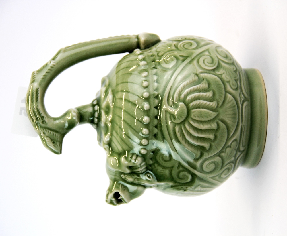 A Chinese incised and celadon glazed porcelain mystery teapot, H. 18.5cm. - Image 2 of 4