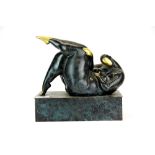 An interesting patinated bronze/brass sculpture of a naked woman, 25 x 12 x 25cm.