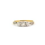 An 18ct yellow gold and platinum ring set with three old cut diamonds, (O).