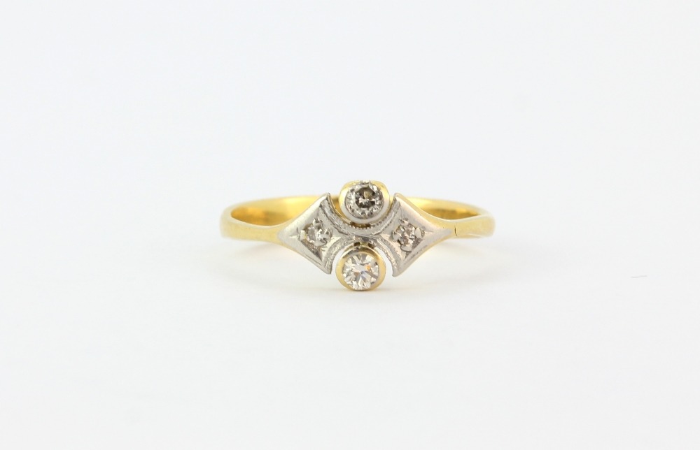 An Art Deco 18ct yellow gold ring set with old cut diamonds, (K).